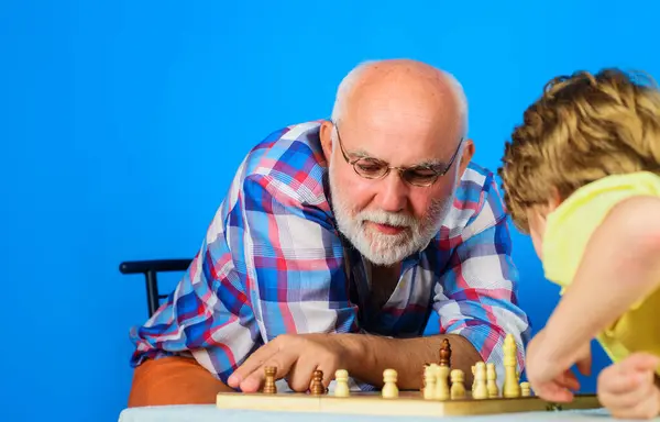 Grandfather Teaching Grandson Play Chess Childhood Board Logic Games Grandpa Лицензионные Стоковые Изображения