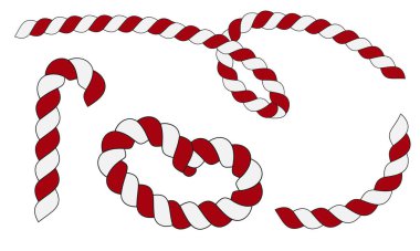 Farklı şekillerde çizgili kırmızı ve beyaz Noel şekerlemeleri.