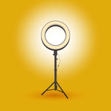 Tripodun üzerinde halka şeklinde vektör lambası