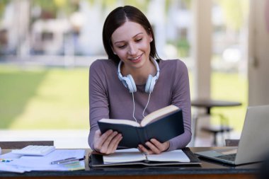 Education concepts, High school Young female student or college students studying and reading She using laptop and learning online