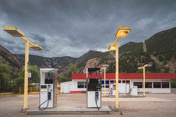 stock image An old abandoned gas station rest stop in mining town Hedley, BC in the Okanagan against a dark moody sky.