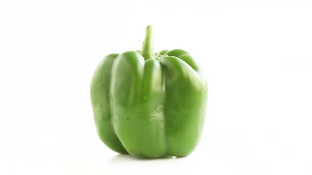 Whole Green Fresh Bell Pepper Capsicum White Background Rotating Side — Stock Video