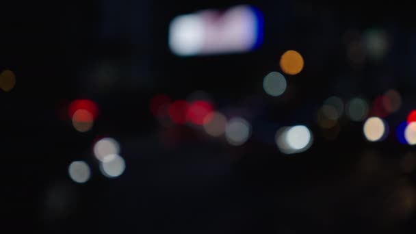 Luces Tráfico Ciudad Nocturna Bokeh Con Ligero Movimiento Desenfocado — Vídeos de Stock