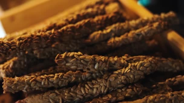 Crunchy Salty Pretzel Sticks Covered Sunflower Seeds Backed Pastry Oven — Stock Video
