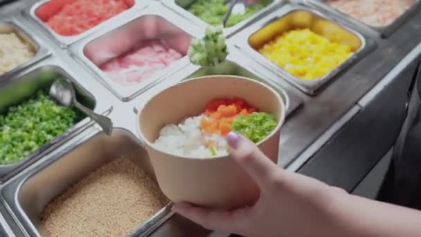Poke Bowl Rice Topped Chopped Cucumber Seaweed Close — Stock Video