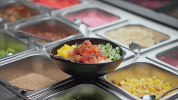 Salmon Ahi Tuna Poke Bowl Ready Serve Hawaiian Dish Close — Stock Video