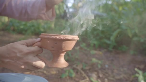 Close Indian Girl Hands Defusing Benzoin Resin Incense Cup Forest — Stock Video