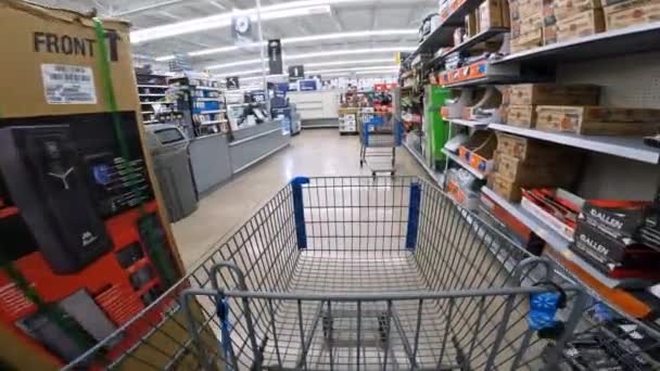 Pov While Pushing Cart Walmart Sporting Goods Many Shelves Have — стоковое видео