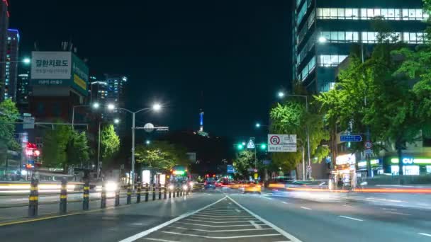 龍山区の交通時間が経過した漢江大路からの南山Nソウルタワーの夜景 — ストック動画