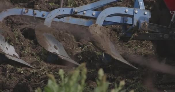 Close Shot Three Furrows Plow Tractor Machinery — Stock Video