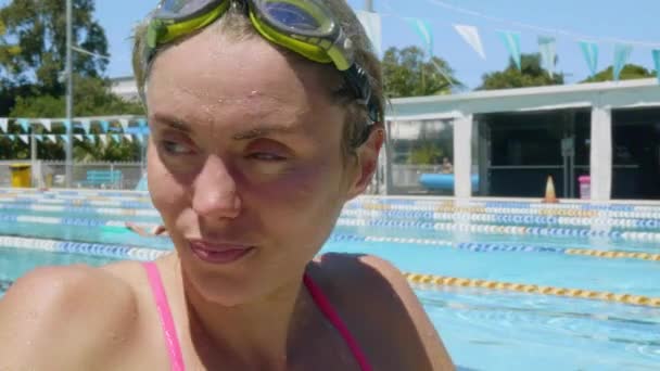 Close Female Swimmer Athlete Put Goggles Side Pool Slow Motion — стоковое видео