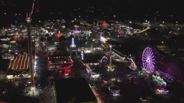 Illuminated Huvi Ratsastaa Washington State Fair Puyallup Washington Yöaikaan Antenni — kuvapankkivideo