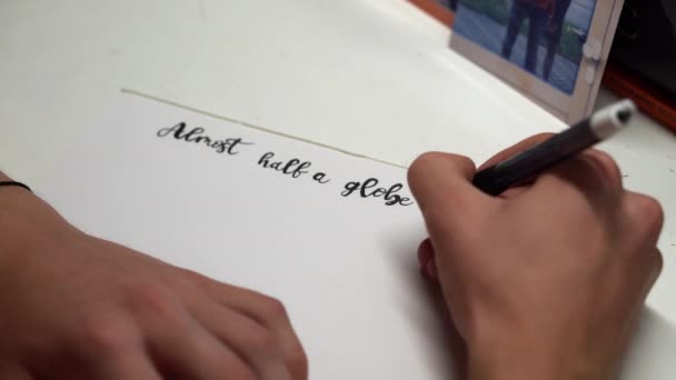 Young Person Hand Practicing Cursive Handwriting Using Black Pen White — Stock Video