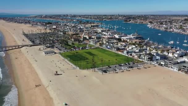 Aerial Balboa Newport Beach Flying Soccer Field Pier Houses Ferries — стокове відео