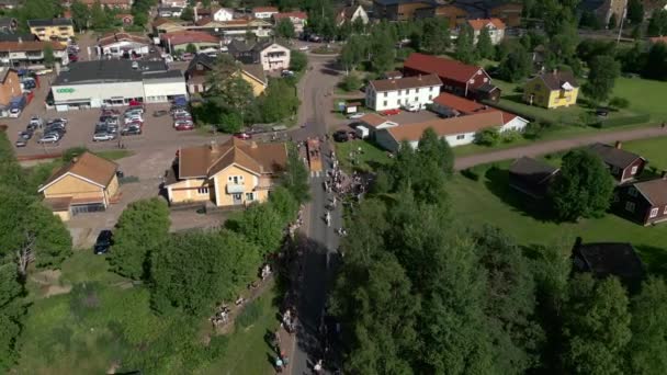 Box Car Race Spectators Watching Each Side Road Orbiting Aerial — Video