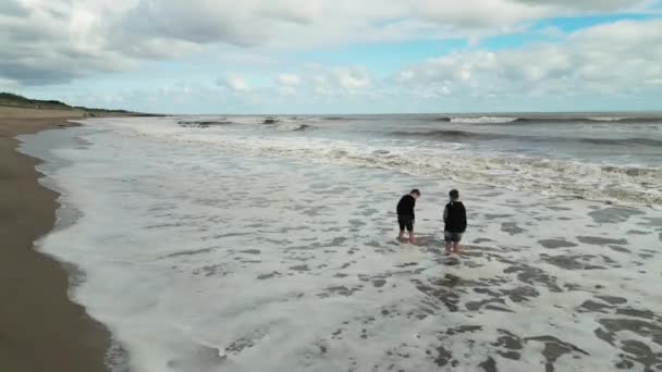 Two Children Boys Swimming Fun Playing Sun Reflection Low Tide — Stock Video