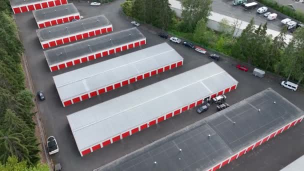Drone Shot Self Storage Service People Actively Loading Units — 비디오