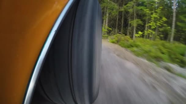Close Retro Car Wheel While Driving Dirt Road Forest — Stock Video