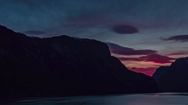 Timelapse Sunset Silhouetted Mountain Lake Fjord Norway Europe — Vídeo de stock