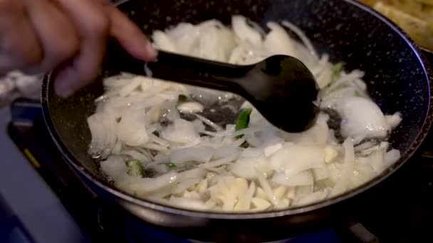 Fresh Cut White Onions Being Stirred Simmering Oil Saucepan Green — Vídeo de stock