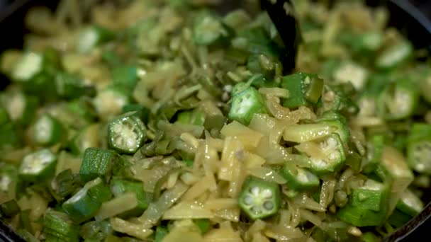 Fresh Sliced Okra Being Mixed Sauted Onions Potatoes Saucepan Close — Vídeo de stock
