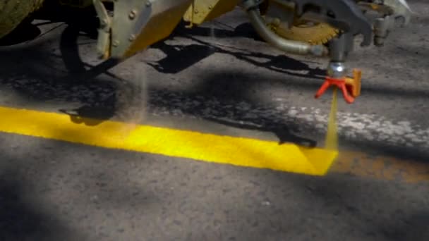 Closeup Slow Motion Panning View Line Striper Machine Painting Yellow — Stock Video
