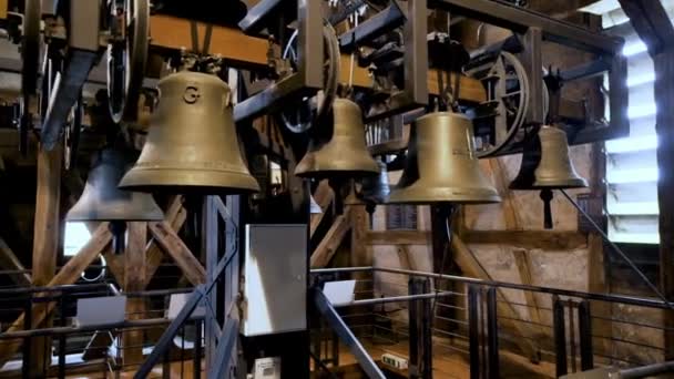 Large Variety Bronze Colored Bells All Pitches Hang Bell Tower — Vídeos de Stock