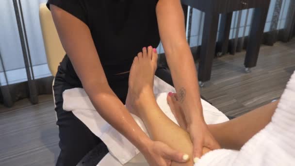 Female Masseuse Massaging Leg Calves Foot Unrecognizable Woman — Stock Video