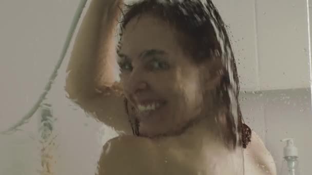 Topless Caucasian Brunette Woman Smiling Looking Directly Camera While Showering — Video