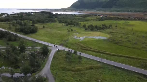 Aerial Shot Some Cyclists Cyling Rough Conditions Lofoten Norway — Stock Video
