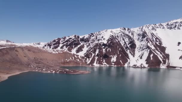 Calm Blue Waters Yeso Dam Surrounded Snowy Mountains Chile Aerial — Stock Video