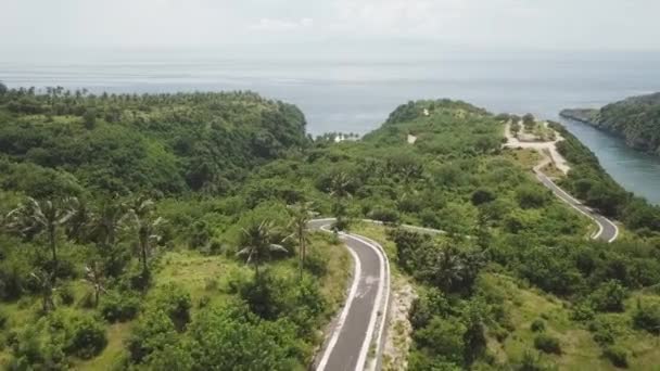 Moto Nadert Schilderachtige Tanjung Juntil Punt Bergachtige Bali Kustweg — Stockvideo