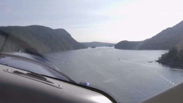 Pilot View Flying Low Mountainous Lake Propeller Airplane — Stock video