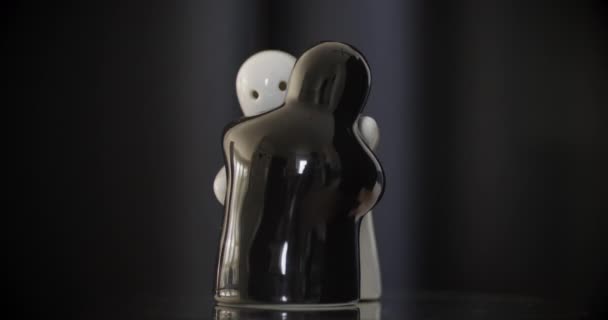 White Black Porcelain Dolls Hugging Each Other Yin Yang Concept — Vídeos de Stock