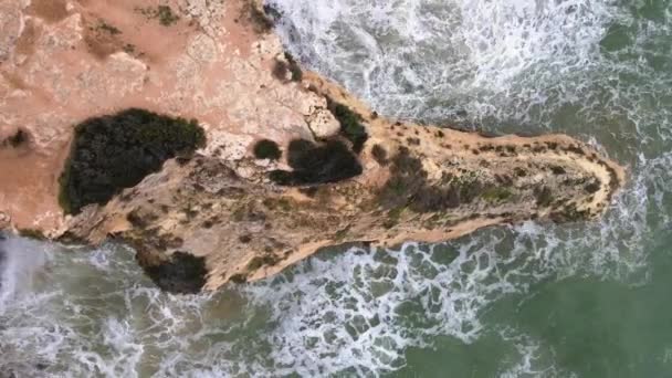Birdseye View While Ascending Rocky Outcrop Surrounded Pounding Waves — Video