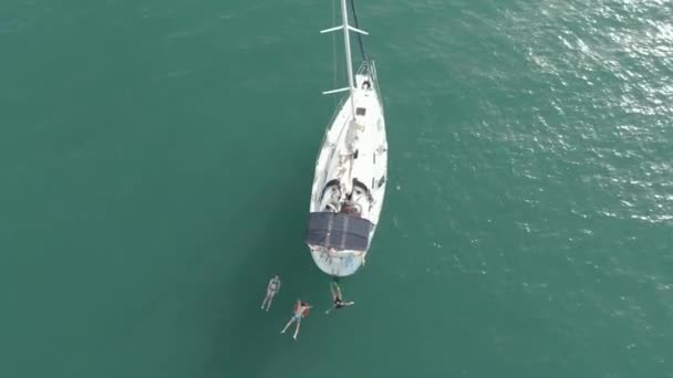 Young People Swimming Having Fun Sea Next Sailing Boat — Video