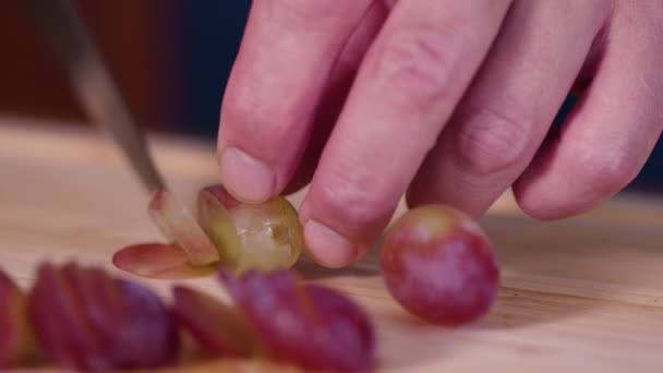 Macro Shot Red Grapes Being Sliced Thinly Sharp Knife — Stock Video