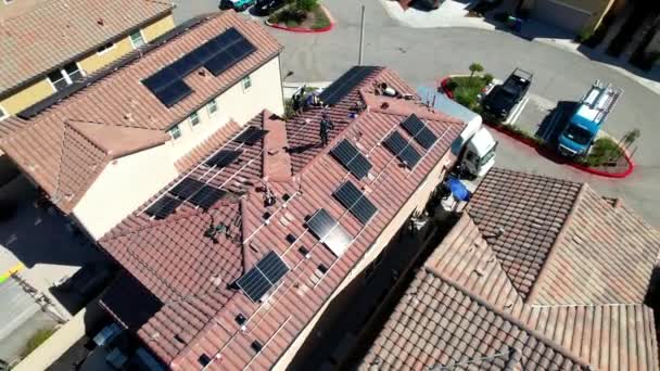 Aerial Overhead View Worker Carrying Solar Panel Roof Installation Circle — Stock Video