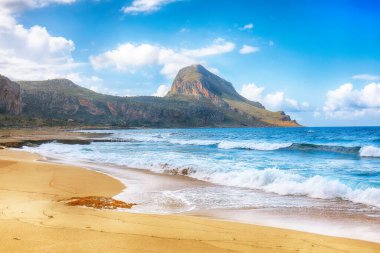 Outstanding seascape of Isolidda Beach near San Vito cape. Popular travel destination of Monte Cofano National Park. Location: San Vito Lo Capo, Province of Trapani, Sicily, Italy, Europe