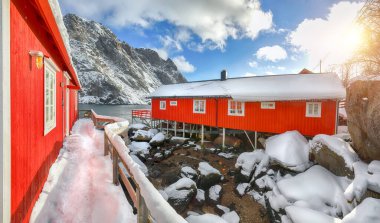 Stunning morning seascape of Norwegian sea and cityscape of Nusfjord village. Popular travel destination on Lofotens. Location: Nusfjord, Flakstad Municipality, Lofoten; Norway, Europe