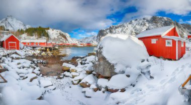 Outstanding morning seascape of Norwegian sea and cityscape of Nusfjord village. Popular travel destination on Lofotens. Location: Nusfjord, Flakstad Municipality, Lofoten; Norway, Europe