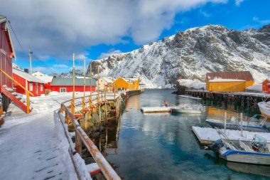 Stunning morning seascape of Norwegian sea and cityscape of Nusfjord village. Popular travel destination on Lofotens. Location: Nusfjord, Flakstad Municipality, Lofoten; Norway, Europe
