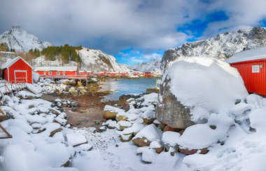 Stunning morning seascape of Norwegian sea and cityscape of Nusfjord village. Popular travel destination on Lofotens. Location: Nusfjord, Flakstad Municipality, Lofoten; Norway, Europe