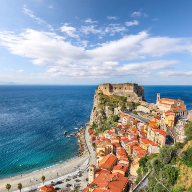 Awesome seaside and village Scilla with old medieval castle on rock Castello Ruffo, colorful traditional typical italian houses on Mediterranean Tyrrhenian sea coast shore, Calabria, Southern Italy