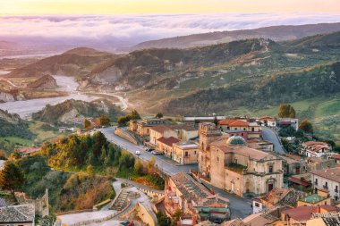 Fantastic sunrise over old famous medieval village Stilo in Calabria. View on city and valley. Location: Stilo, Southern Italy. Calabria. Europe 