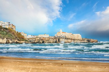 Attractive view on Vieste and Pizzomunno beach, Gargano peninsula, Apulia, southern Italy, Europe.