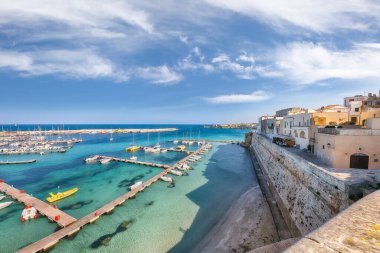 Breathtaking view on harbour of Otranto in Italy with lots of boats and yachts. Italian vacation. Town Otranto, province of Lecce in the Salento peninsula, Puglia, Italy