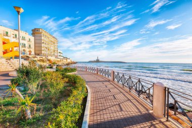 Stunning view on Lighthouse of Vieste, rising on the isle of Santa Eufemia. Lighthouse In Vieste, Gargano Peninsula, Apulia region, Italy, Europe