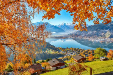 Incredible view of the meadows and mountains around  Zell lake or Zeller See .  Location:  Zell am See,  Zell am See district, Salzburg state, Austria clipart