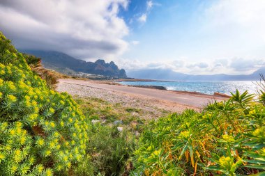 Outstanding seascape of Isolidda Beach near San Vito cape. Popular travel destination of Monte Cofano National Park. Location: San Vito Lo Capo, Province of Trapani, Sicily, Italy, Europe